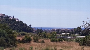 Grundstück in Santa Eulalia mit Meerblick zum Verkauf