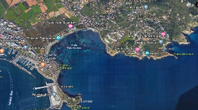 Grundstück mit Projekt und Lizenz in bester Lage auf Ibiza in erster Meereslinie mit Zufahrt